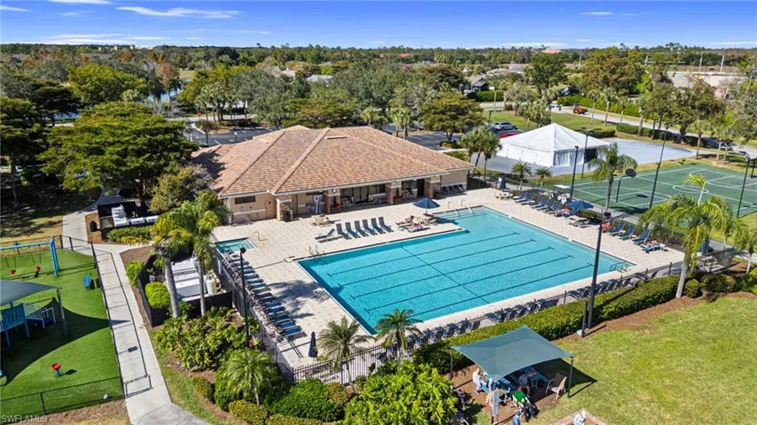Community pool featuring a patio area