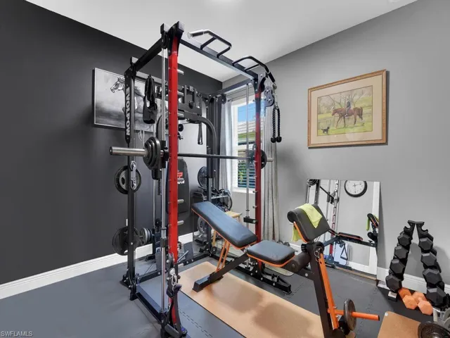 Exercise area featuring baseboards