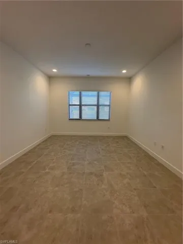 Spare room with recessed lighting