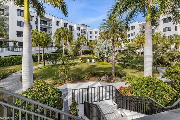 featuring a lawn and dog park
