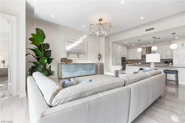 Living room featuring an inviting chandelier