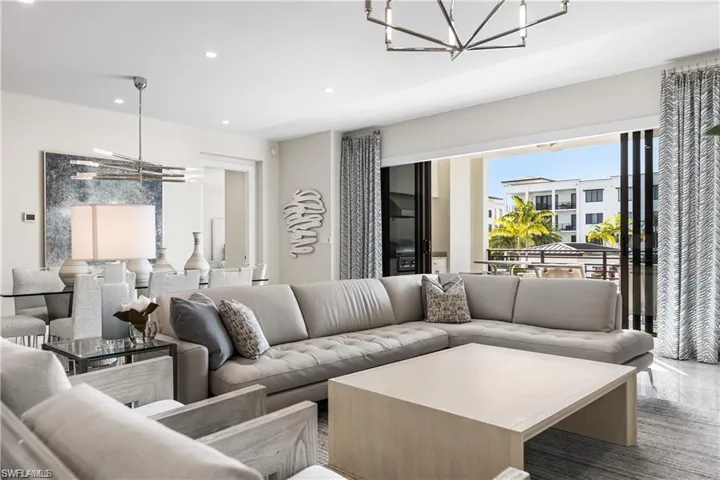 Living room featuring a chandelier