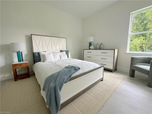 Bedroom with light wood-type flooring