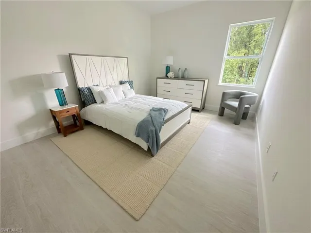 Bedroom with light wood-type flooring