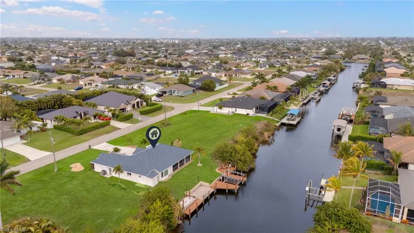 Aerial view of residential area with a nearby body of water