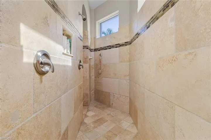 Primary Bathroom with walk-in tiled shower