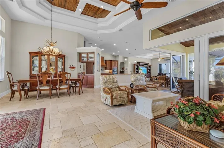 Living room and dining area with tray ceiling
