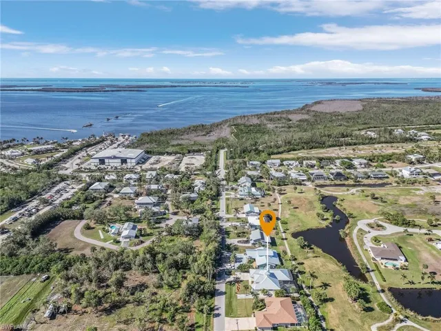 Bird's view of property with close proximity to Gulf of Mexico