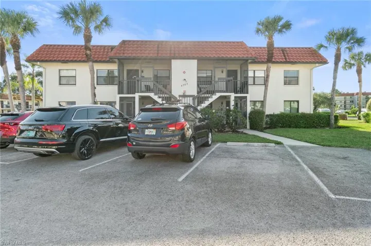 Exterior view of building. Subject property is on the lower left first-floor.
