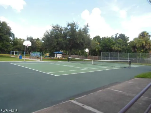 View of sport court with basketball hoop