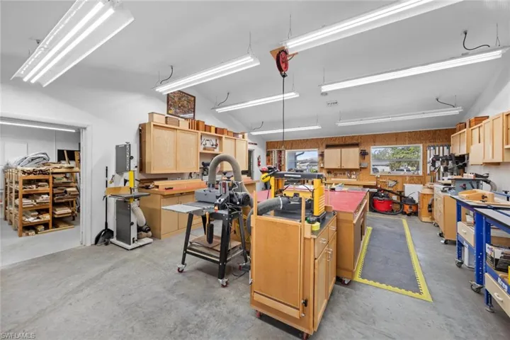 Garage featuring a workshop area