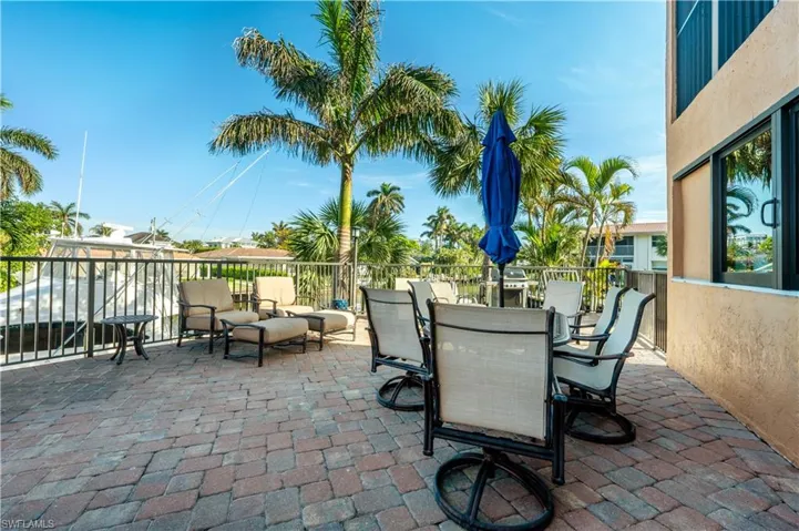 pool lounge area with grill