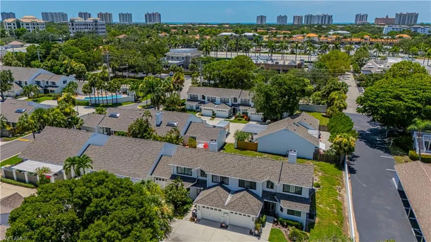 Aerial perspective of suburban area featuring skyline