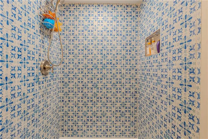 Bathroom with a tile shower