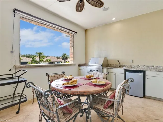 Main Level Balcony featuring an outdoor kitchen and alfresco dining