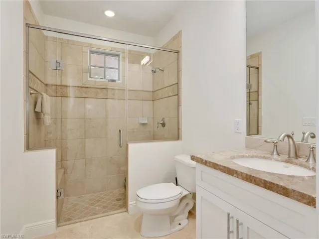 Guest Bathroom Walk-in shower with clear glass enclosure on the ground floor