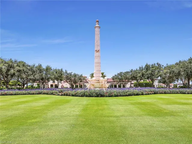 The Great Lawn with a central stone obelisk fountain