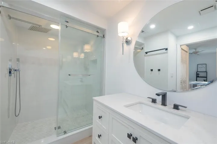Bathroom featuring new shower and vanity