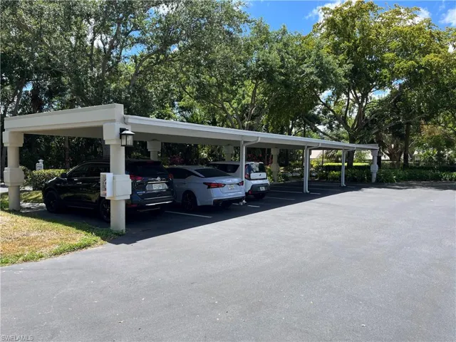 One Covered Carport assigned to unit, plenty of guest parking