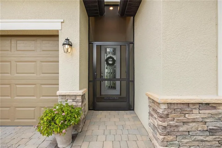 Property entrance with a garage
