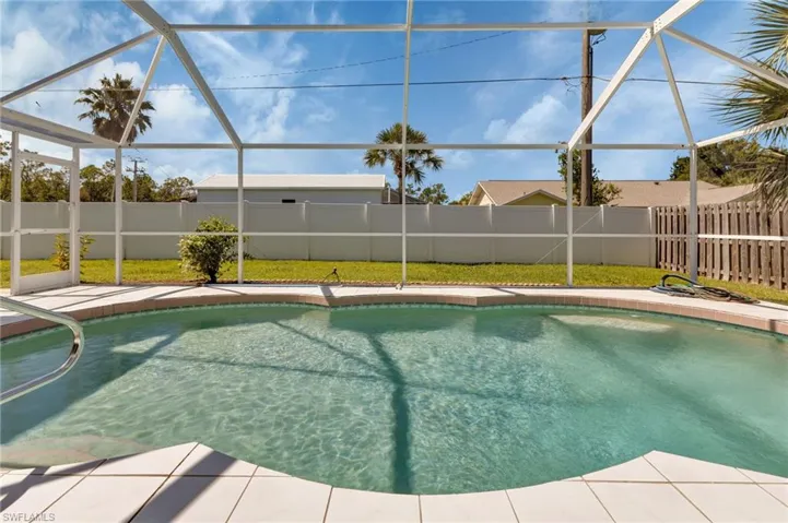 View of pool featuring a lanai