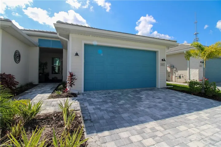 Garage with decorative driveway