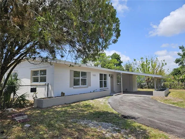 1102 E Bougainvillea  RD, Lehigh Acres, FL 33936