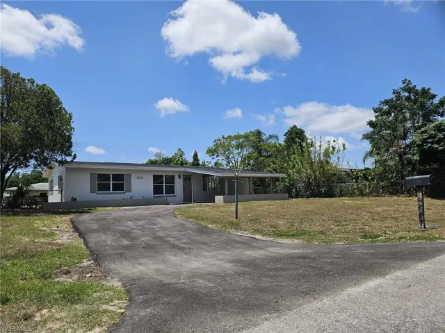 1102 E Bougainvillea  RD, Lehigh Acres, FL 33936