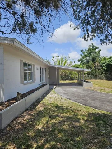 1102 E Bougainvillea  RD, Lehigh Acres, FL 33936