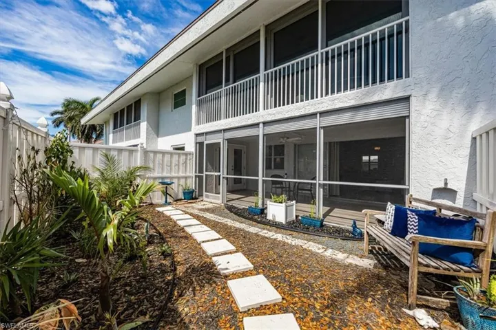 Private yard with stepping stones facing the condo