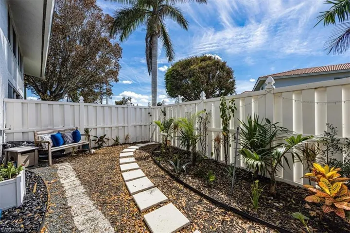Private fenced yard belongs only to this unit. Enjoy the outdoor lounge area or hone your gardening skills