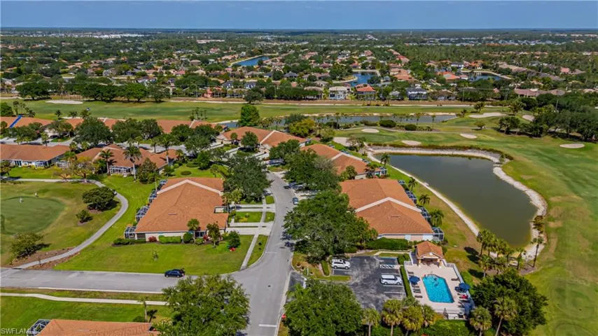 View of property location featuring a golf course view, Club home I pool area.