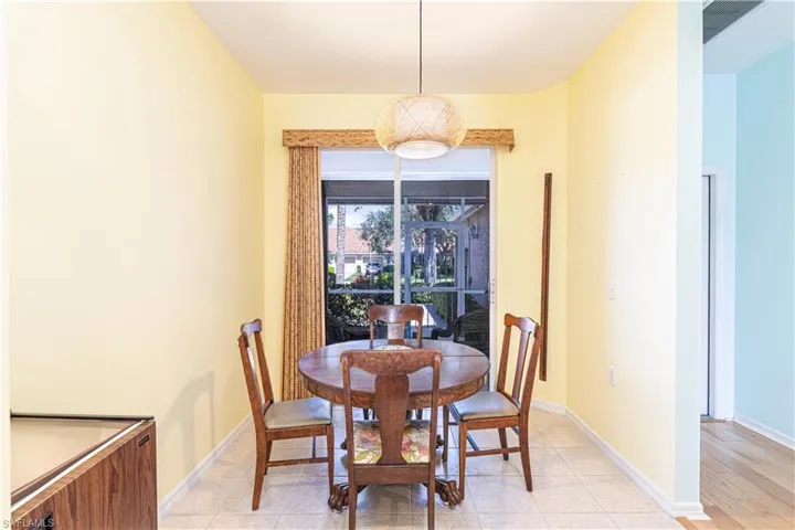 Breakfast nook-Dining space with light tile patterned flooring