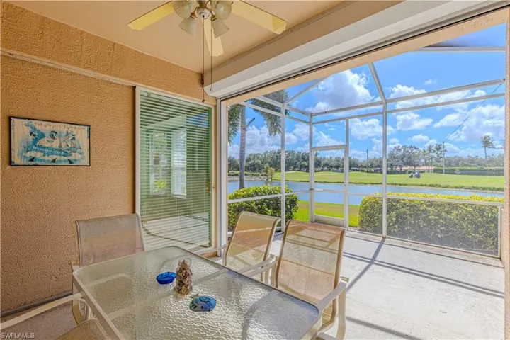 Lania with a water view, ceiling fan, and patio furnature