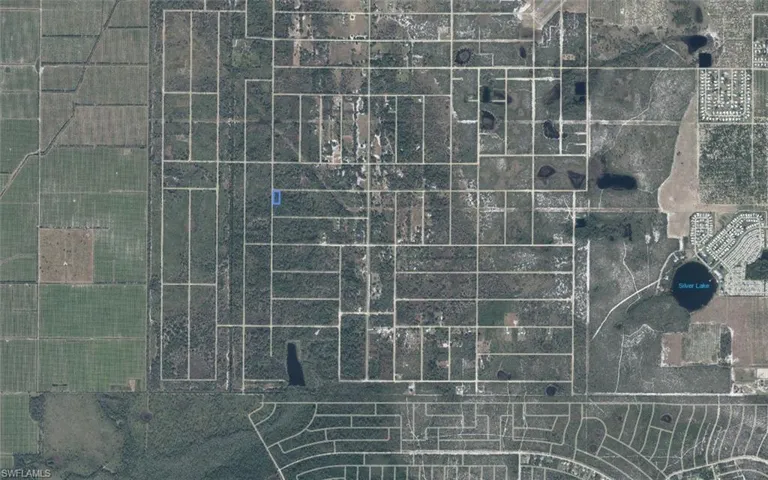 Aerial Map. Displaying land divisions and a body of water in the property's vicinity