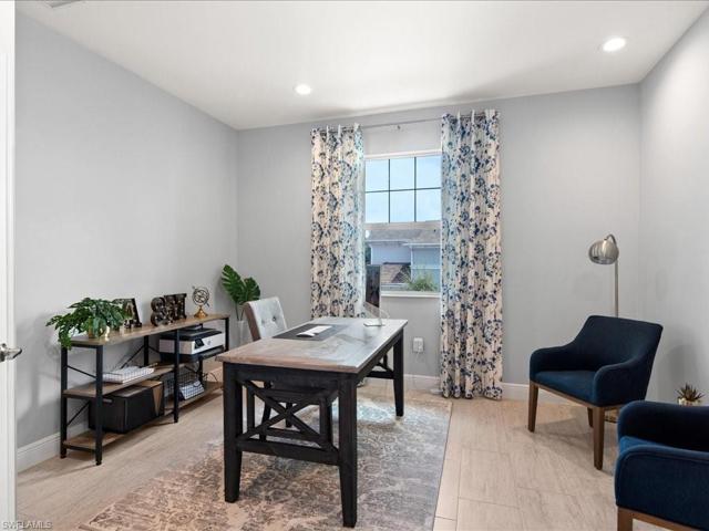 Den with desk and furniture