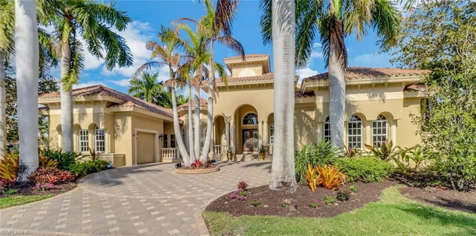 Beautiful palm trees in front of home