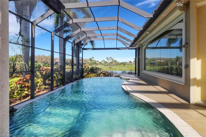 Infinity pool with view of 14th and 15th holes of Whispering Oak golf course
