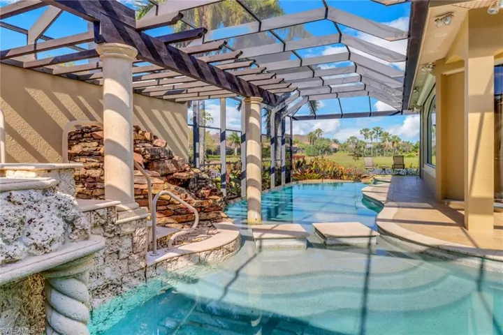 Waterfall into infinity pool