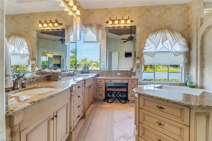 Full bath with double sinks and makeup station