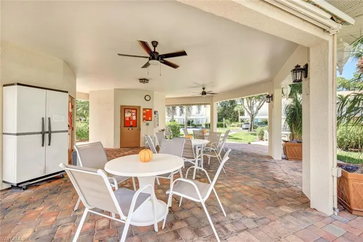 View of patio / terrace featuring outdoor dining space and ceiling fan