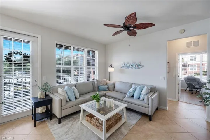 Living space featuring tiled flooring and neutral wall tones