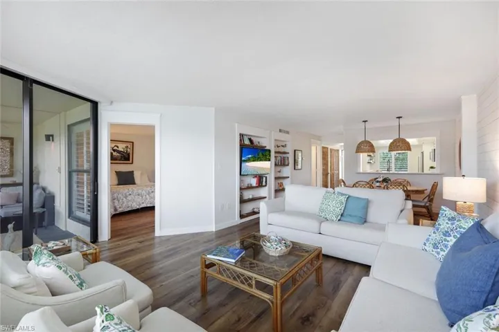 Living room featuring dark wood-type flooring