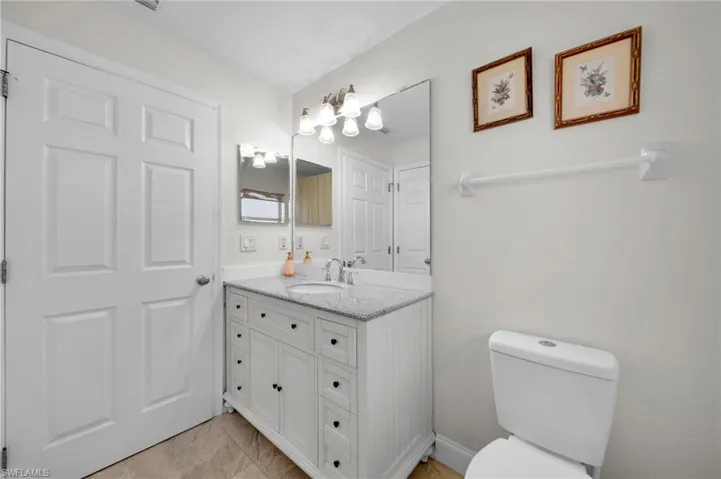 Bathroom with toilet and vanity