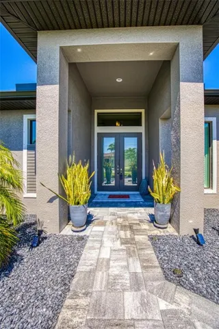 Entrance to property with french doors