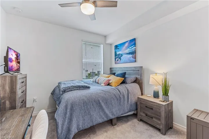 Guest room with a desk & chair