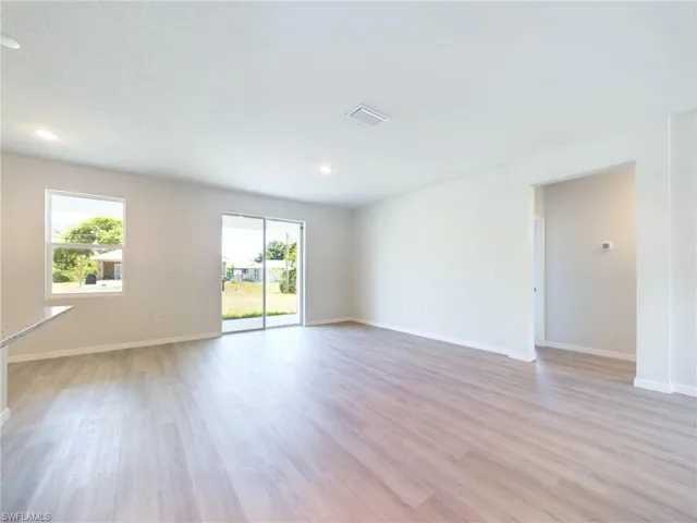 Spare room featuring light hardwood / wood-style flooring