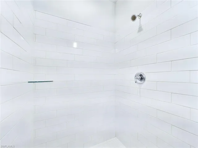 Bathroom with a tile shower