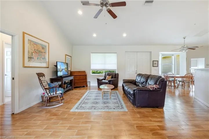 Living room featuring ceiling fan