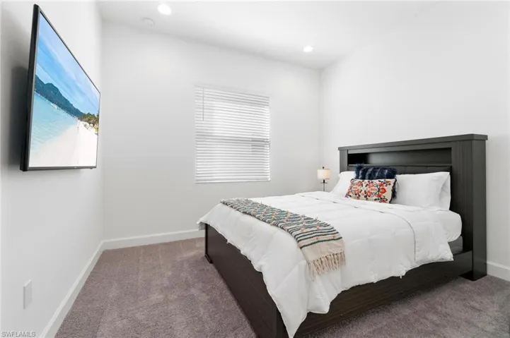 Bedroom with carpet flooring